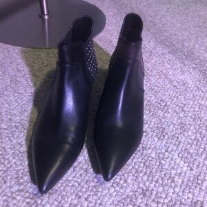 Black booties with silver detailing